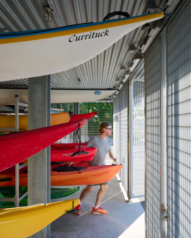 Interior view of boat storage at the Brooklyn Bridge Park Boathouse. Photo by Kyle Knodell.