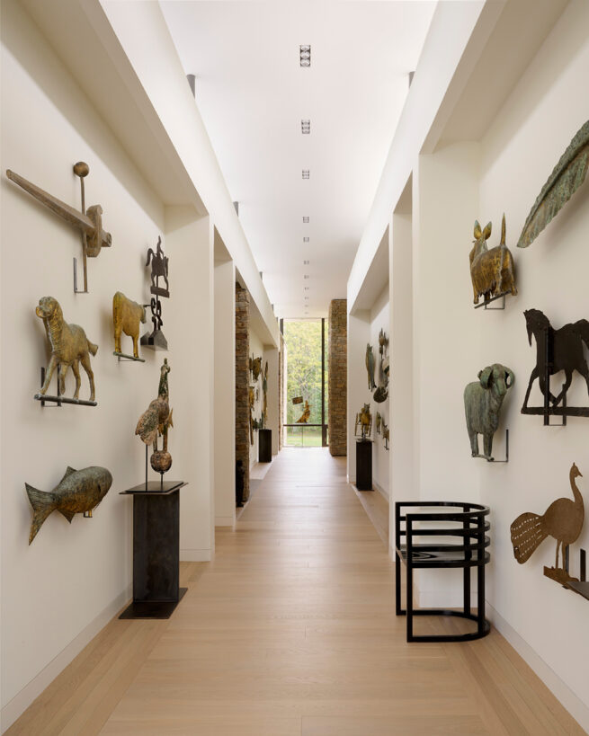 Photo of hallway with art by Jason Schmidt.