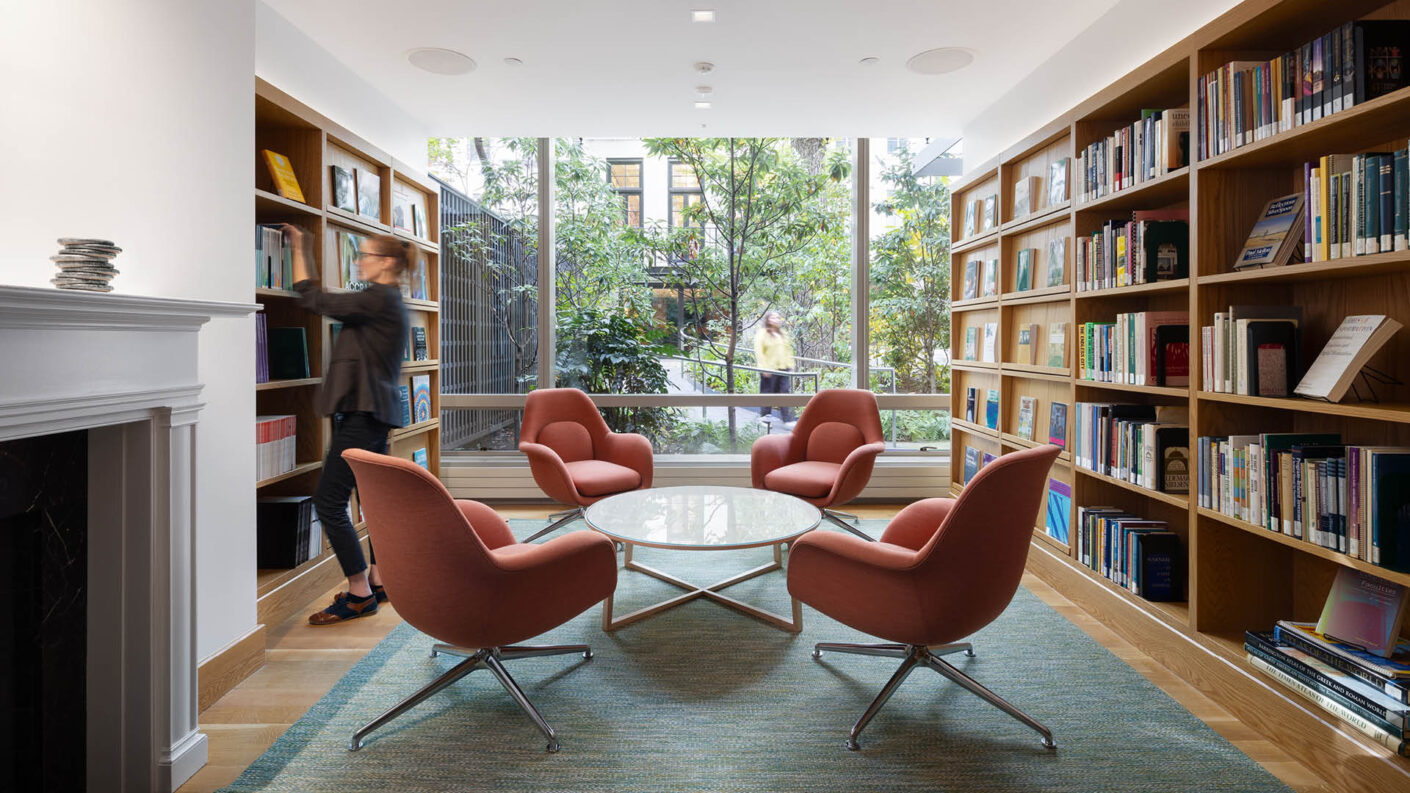 Photograph of a ground-floor meeting room that looks out onto a back garden. (c) Devon Banks