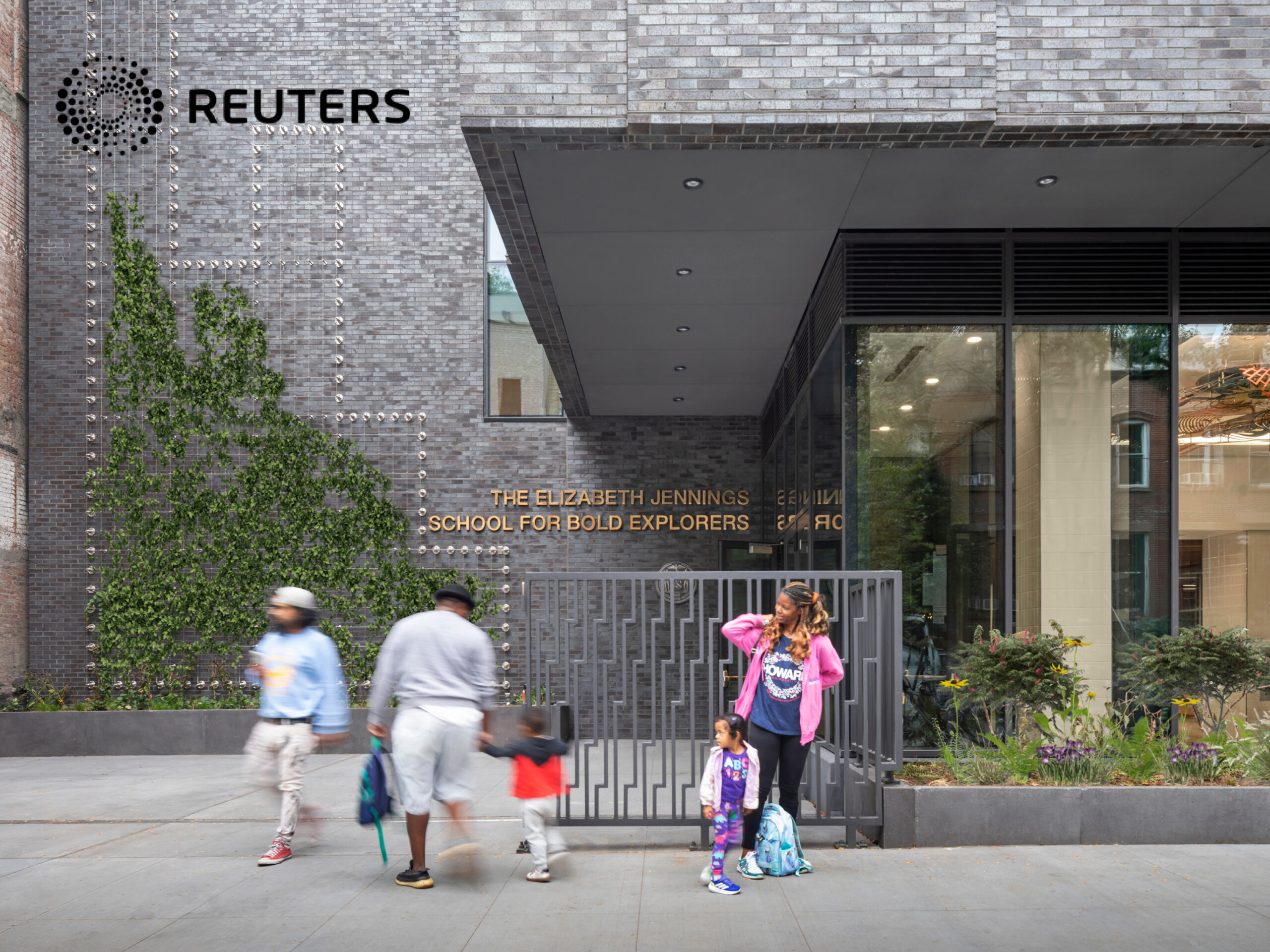 Photo of entrance to PS 456 with Reuters logo in upper left corner